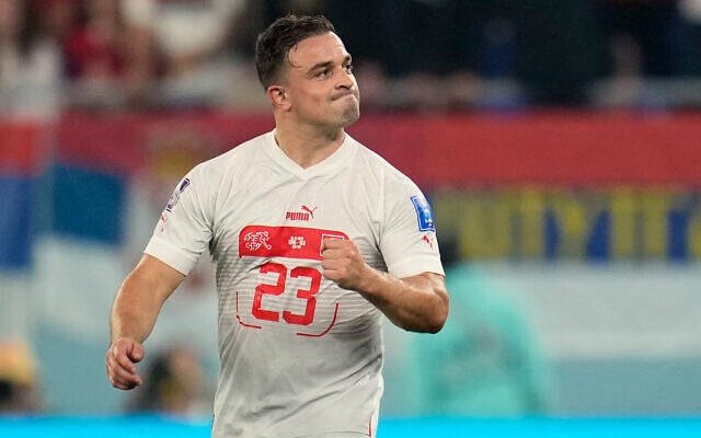 Switzerland's Xherdan Shaqiri celebrates after scoring his side's first goal during the World Cup group G soccer match between Serbia and Switzerland, in Doha, Qatar, December 2, 2022. (AP Photo/Ricardo Mazalan) Switzerland's Xherdan Shaqiri celebrates after scoring his side's first goal during the World Cup group G soccer match between Serbia and Switzerland, in Doha, Qatar, December 2, 2022. (AP Photo/Ricardo Mazalan)