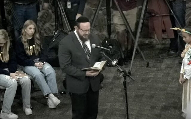 Mark Aaron Griffin, a Messianic "rabbi" awaiting trial on four counts of sexual assault, leads the opening prayer at Keller Independent School District's board meeting, December 12, 2022. (Screenshot via JTA, used in accordance with Clause 27a of the Copyright Law) Mark Aaron Griffin, a Messianic "rabbi" awaiting trial on four counts of sexual assault, leads the opening prayer at Keller Independent School District's board meeting, December 12, 2022. (Screenshot via JTA, used in accordance with Clause 27a of the Copyright Law)