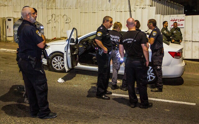 Police at the scene of a deadly shooting in Umm al-Fahm, September 4, 2022. (Flash90) Police at the scene of a deadly shooting in Umm al-Fahm, September 4, 2022. (Flash90)