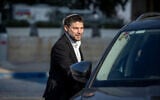 Religious Zionist party leader Bezalel Smotrich after coalition talks with Shas's Aryeh Deri and Likud head Benjamin Netanyahu, in Jerusalem, December 5, 2022. (Yonatan Sindel/Flash90)