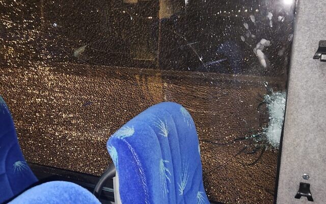 Damage caused to an Israeli bus in a shooting attack near Ofra in the West Bank, early December 2, 2022. (Courtesy) Damage caused to an Israeli bus in a shooting attack near Ofra in the West Bank, early December 2, 2022. (Courtesy)