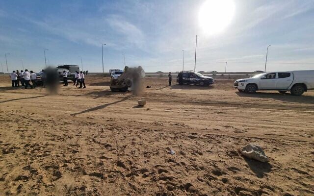 Police officers at the scene of a car chase with kidnappers in the south on December 12, 2022. (Israel Police) Police officers at the scene of a car chase with kidnappers in the south on December 12, 2022. (Israel Police)