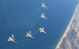 French Rafale fighter jets fly alongside an IAF F-16i aircraft over the Mediterranean Sea during a drill, December 6, 2022. (Israel Defense Forces)