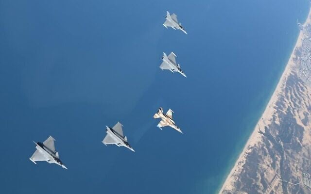 French Rafale fighter jets fly alongside an IAF F-16i aircraft over the Mediterranean Sea during a drill, December 6, 2022. (Israel Defense Forces)