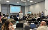 US Cyber Command officers and Israeli military cyber officials participate in a drill at the Georgia Cyber Center, in Augusta, Georgia, in early December 2022. (Israel Defense Forces)