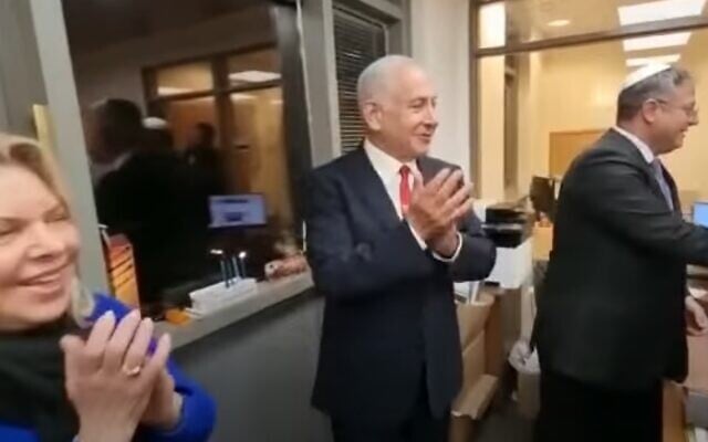 Incoming Prime Minister Benjamin Netanyahu lights Hanukkah candles with his wife Sara and incoming national security minister Itamar Ben Gvir, December 21, 2022 (Youtube screenshot) Incoming Prime Minister Benjamin Netanyahu lights Hanukkah candles with his wife Sara and incoming national security minister Itamar Ben Gvir, December 21, 2022 (Youtube screenshot)