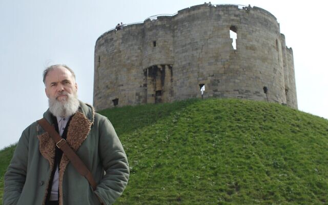 Filmmaker David Wilkinson at castle in York, where the entire Jewish community was murdered in 1190 (courtesy)