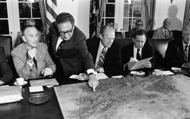 September 4, 1975 – Cabinet Room – The White House – Washington, DC – Gerald R. Ford, Sens. Mansfield, Byrd, Scott, Griffin, Curtis, Sparkman, Thurmond, Stennis; Reps. Albert, Tip O'Neill, McFall, Rhodes, Michel, Burton, Morgan, Broomfield, Price, Wilson, Anderson; Kissinger, Sisco, Friedersdorf, Greenspan, Nessen, Cannon, Lynn, Staff – seated around table; all not in frame – Bipartisan Congressional Briefing to Discuss Energy, the Middle East, and Congressional Travel During August 1975 (US National Archives) September 4, 1975 – Cabinet Room – The White House – Washington, DC – Gerald R. Ford, Sens. Mansfield, Byrd, Scott, Griffin, Curtis, Sparkman, Thurmond, Stennis; Reps. Albert, Tip O'Neill, McFall, Rhodes, Michel, Burton, Morgan, Broomfield, Price, Wilson, Anderson; Kissinger, Sisco, Friedersdorf, Greenspan, Nessen, Cannon, Lynn, Staff – seated around table; all not in frame – Bipartisan Congressional Briefing to Discuss Energy, the Middle East, and Congressional Travel During August 1975 (US National Archives)