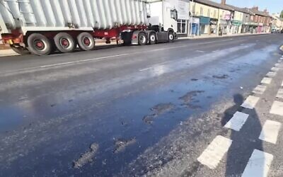 Asphalt on UK roads melted during scorching temperatures in July 2021. (Youtube screenshot)