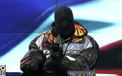 Kanye West seen during an appearance on InfoWars with Alex Jones on December 1, 2022. (Screen capture: Twitter; used in accordance with Clause 27a of the Copyright Law)