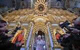 Serhiy Petrovytch Doumenko, Metropolitan Epifaniy of Kyiv, Head of Ukraine church, leads an Orthodox Christmas service at Kyiv Pechersk Lavra monastery in Kyiv on January 7, 2023. (Sergei Supinsky/AFP)