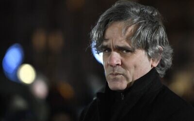 French satirical weekly newspaper Charlie Hebdo's publication director, cartoonist and writer Laurent Sourisseau, known as Riss, attends a commemorative ceremony marking the 8th anniversary of the 2015 deadly Islamist terror attack on the Hyper Cacher Jewish supermarket in Paris, January 9, 2023. (Julien De Rosa/AFP)