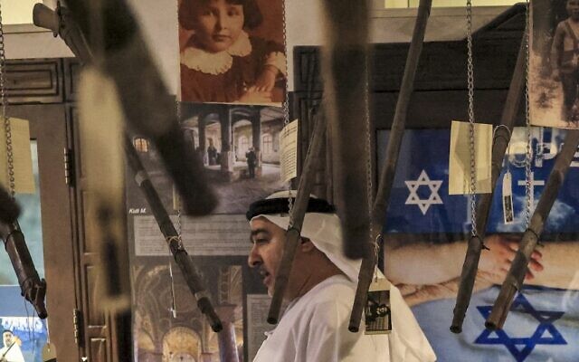 Ahmed al-Mansoori, director of the "Crossroads of Civilizations Museum", shows visitors around the Holocaust Gallery at the facility in Dubai on January 11, 2023. (Karim SAHIB / AFP) Ahmed al-Mansoori, director of the "Crossroads of Civilizations Museum", shows visitors around the Holocaust Gallery at the facility in Dubai on January 11, 2023. (Karim SAHIB / AFP)