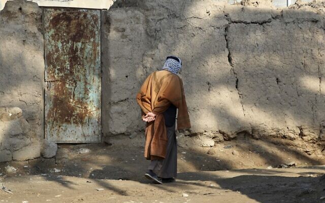 Jabbar Alwan, who lost four family members to violence, is pictured at the scene of an attack by Islamic States (IS) group members, in the village of Albu Bali in the Dyala province northeast of the Iraqi capital Baghdad, on January 12, 2023. (AHMAD AL-RUBAYE / AFP) Jabbar Alwan, who lost four family members to violence, is pictured at the scene of an attack by Islamic States (IS) group members, in the village of Albu Bali in the Dyala province northeast of the Iraqi capital Baghdad, on January 12, 2023. (AHMAD AL-RUBAYE / AFP)