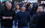 Illustrative: Fans arrive ahead of the English Premier League soccer match between Tottenham Hotspur and Arsenal at Tottenham Hotspur Stadium in London, on January 15, 2023. (Adrian Dennis/AFP)