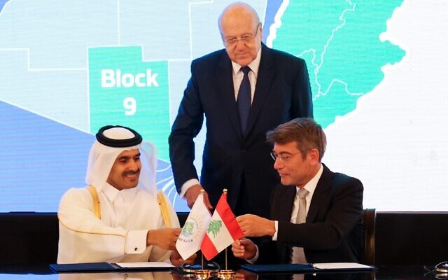 Left to right: Qatar's Minister of State for Energy Affairs Saad Sherida al-Kaabi, Lebanon's caretaker Prime Minister Najib Mikati and Lebanon's caretaker Energy Minister Walid Fayad attend a joint signing ceremony for offshore gas exploration in the capital Beirut on January 29, 2023. (Anwar Amro/AFP)
