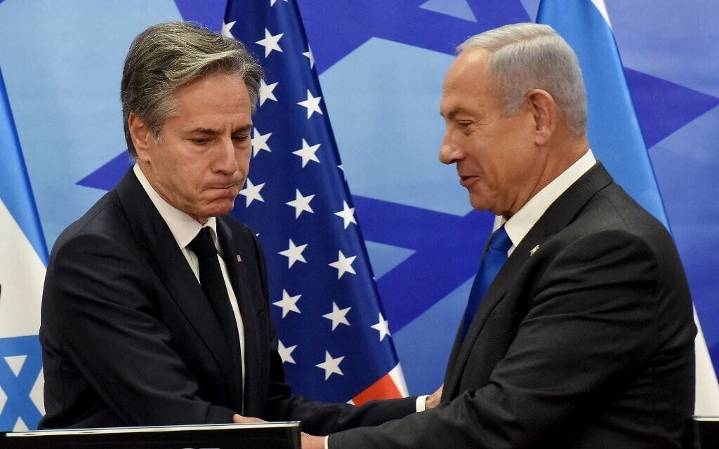 US Secretary of State Antony Blinken (left) shakes hands with Prime Minister Benjamin Netanyahu, during a press conference in Jerusalem on January 30, 2023. (Debbie HIll/Pool/AFP) US Secretary of State Antony Blinken (left) shakes hands with Prime Minister Benjamin Netanyahu, during a press conference in Jerusalem on January 30, 2023. (Debbie HIll/Pool/AFP)