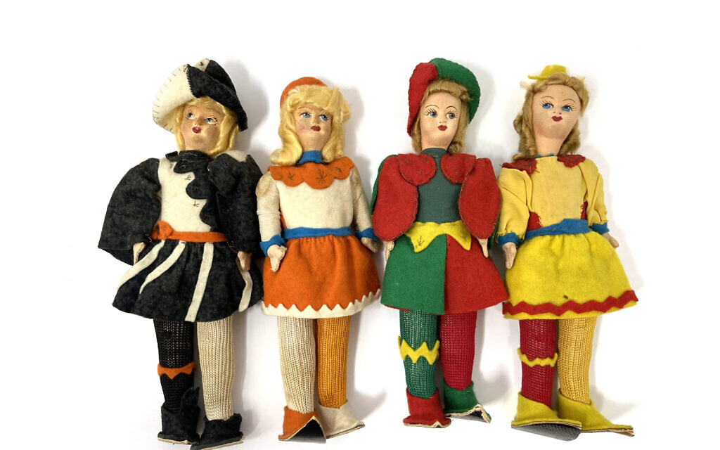 Dolls made by stateless Jewish children residing in a DP camp near Florence, Italy, known as 'Kibbutz HaOved,' with help from funds provided by the Joint Distribution Committee. The dolls are attired in local costumes based on the districts of the Tuscan city of Sienna. (YIVO Institute for Jewish Research via JTA)
