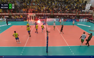 A flare is thrown at the volleyball court by Maccabi Tel Aviv fans during the quarter-final Challenger Cup match against Nicosia's Omonia V.C. in Tel Aviv, January 12, 2022. (Channel 5 screenshot: used in accordance with Clause 27a of the Copyright Law)
