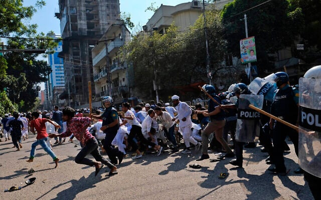 Illustrative: Police clash with protesters outside the Baitul Mukarram Mosque in Dhaka, Bangladesh, Oct. 15, 2021. (AP Photo/Mahmud Hossain Opu) Illustrative: Police clash with protesters outside the Baitul Mukarram Mosque in Dhaka, Bangladesh, Oct. 15, 2021. (AP Photo/Mahmud Hossain Opu)
