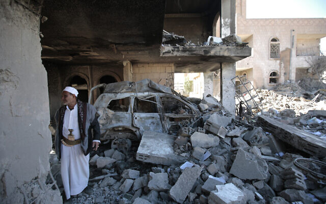 File: A man inspects the wreckage of a building after it was damaged in Saudi-led coalition airstrikes, in Sanaa, Yemen, January 18, 2022. (Hani Mohammed/AP) File: A man inspects the wreckage of a building after it was damaged in Saudi-led coalition airstrikes, in Sanaa, Yemen, January 18, 2022. (Hani Mohammed/AP)