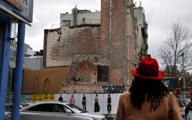 Senior Minister Rev. Jacqueline Lewis, right, looks up at the burned remains of Middle Collegiate Church on April 10, 2022 (AP Photo/Jessie Wardarski) Senior Minister Rev. Jacqueline Lewis, right, looks up at the burned remains of Middle Collegiate Church on April 10, 2022 (AP Photo/Jessie Wardarski)