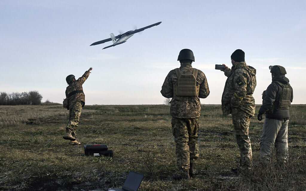 Ukrainian soldiers launch a drone at Russian positions near Bakhmut, Donetsk region, Ukraine, December 15, 2022. (LIBKOS/AP) Ukrainian soldiers launch a drone at Russian positions near Bakhmut, Donetsk region, Ukraine, December 15, 2022. (LIBKOS/AP)