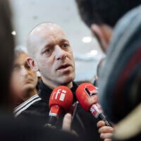 Palestinian French-lawyer and activist Salah Hamouri talks to reporters as he arrives at Charles de Gaulle Airport in Paris after his extradition from Israel to France, December 18, 2022. (AP Photo/Lewis Joly)