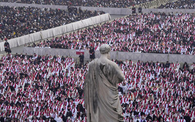 Faithful attend the funeral mass for late Pope Emeritus Benedict XVI in St. Peter's Square at the Vatican, January 5, 2023. (Ben Curtis/AP)