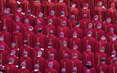Members of the church attend the funeral mass for late Pope Emeritus Benedict XVI in St. Peter's Square at the Vatican, January 5, 2023. (Ben Curtis/AP)