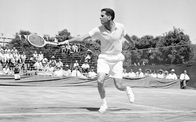 Dick Savitt hits a shot during a Davis Cup tennis match against Fumiteru Nakano of Japan, in Louisville, Kentucky, on July 20, 1951 (AP Photo/H.B. Littell, File) Dick Savitt hits a shot during a Davis Cup tennis match against Fumiteru Nakano of Japan, in Louisville, Kentucky, on July 20, 1951 (AP Photo/H.B. Littell, File)