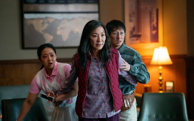 From left, Stephanie Hsu, Michelle Yeoh and Ke Huy Quan in a scene from, 'Everything Everywhere All At Once.' (Allyson Riggs/ A24 Films via AP) From left, Stephanie Hsu, Michelle Yeoh and Ke Huy Quan in a scene from, 'Everything Everywhere All At Once.' (Allyson Riggs/ A24 Films via AP)