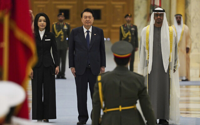 From left, South Korean first lady Kim Keon Hee, South Korean President Yoon Suk Yeol and Emirati leader Sheikh Mohammed bin Zayed Al Nahyan attend a ceremony at Qasar Al Watan in Abu Dhabi, United Arab Emirates, January 15, 2023. (AP Photo/Jon Gambrell) From left, South Korean first lady Kim Keon Hee, South Korean President Yoon Suk Yeol and Emirati leader Sheikh Mohammed bin Zayed Al Nahyan attend a ceremony at Qasar Al Watan in Abu Dhabi, United Arab Emirates, January 15, 2023. (AP Photo/Jon Gambrell)