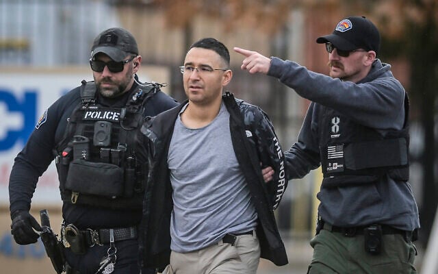 Solomon Pena, center, a Republican candidate for New Mexico House District 14, is taken into custody by Albuquerque Police officers, Monday, Jan. 16, 2023, in southwest Albuquerque, New Mexico (Roberto E. Rosales/The Albuquerque Journal via AP) Solomon Pena, center, a Republican candidate for New Mexico House District 14, is taken into custody by Albuquerque Police officers, Monday, Jan. 16, 2023, in southwest Albuquerque, New Mexico (Roberto E. Rosales/The Albuquerque Journal via AP)