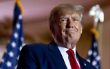 Former US President Donald Trump announces he is running for president for the third time as he smiles while speaking at Mar-a-Lago in Palm Beach, Florida, November 15, 2022. (Andrew Harnik/AP)