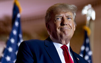 Former US President Donald Trump announces he is running for president for the third time as he smiles while speaking at Mar-a-Lago in Palm Beach, Florida, November 15, 2022. (Andrew Harnik/AP)