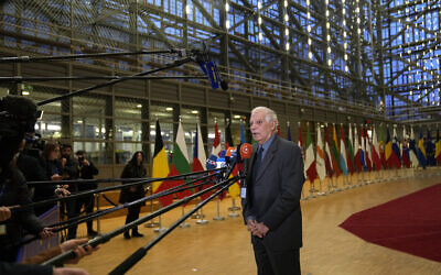 European Union foreign policy chief Josep Borrell speaks with the media as he arrives for a meeting of EU foreign ministers at the European Council building in Brussels on January 23, 2023. (Virginia Mayo/AP)