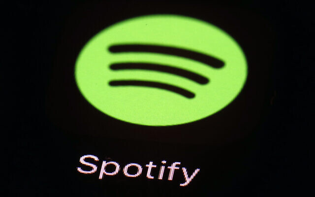 FILE- This March 20, 2018 file photo shows the Spotify app on an iPad in Baltimore. (AP Photo/Patrick Semansky, File)