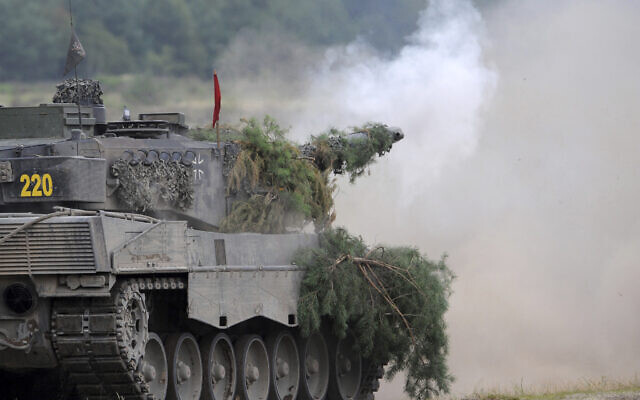 A Leopard 2A6 tank from the Bundeswehr's Panzer exercise bataillon 93 fires at the Oberlausitz training area in Weisskeissel, Germany, August 12, 2009. (Ralf Hirschberger/dpa via AP, file) A Leopard 2A6 tank from the Bundeswehr's Panzer exercise bataillon 93 fires at the Oberlausitz training area in Weisskeissel, Germany, August 12, 2009. (Ralf Hirschberger/dpa via AP, file)