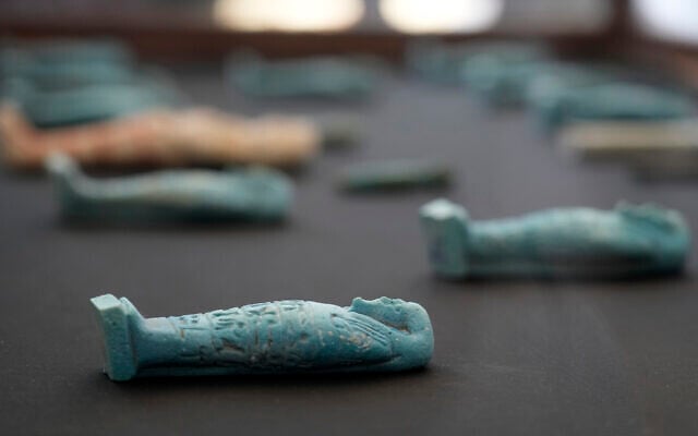 Recently discovered artifacts are displayed during a press conference at the site of the Step Pyramid of Djoser in Saqqara, southwest of Cairo, Egypt, January 26, 2023. (Amr Nabil/AP)
