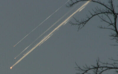 Debris from the space shuttle Columbia streaks across the Texas sky as seen from Dallas on Saturday, February 1, 2003. (Jason Hutchinson/AP)
