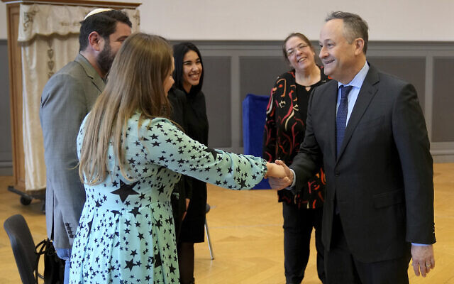 The Second Gentleman of the United States, Douglas Emhoff, right, greets refugees from Ukraine during a visit of the 'Neue Synagoge' (New Synagogue) in Berlin, Germany, January 31, 2023. (Michael Sohn/AP)