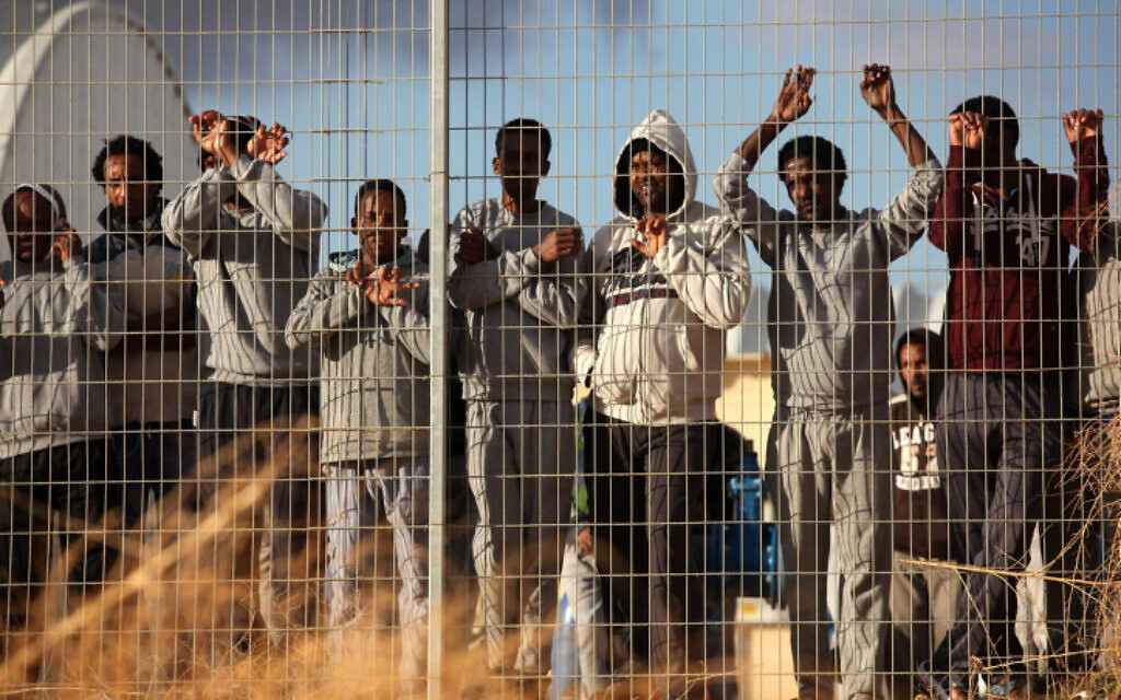 African migrants protest at the Holot detention center near Ketziot, in the Negev Desert, southern Israel, February 17, 2014. (FLASH90) African migrants protest at the Holot detention center near Ketziot, in the Negev Desert, southern Israel, February 17, 2014. (FLASH90)