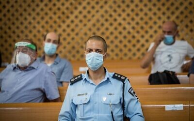 Police Commander Kobi Yaakobi, in a maske due to the COVID-19 pandemic, at a court hearing for a petition filed by local residents to cancel demonstrations in front of the official residence of then-prime minister Benjamin Netanyahu at the Supreme Court in Jerusalem on August 16, 2020. (Yonatan Sindel/Flash90