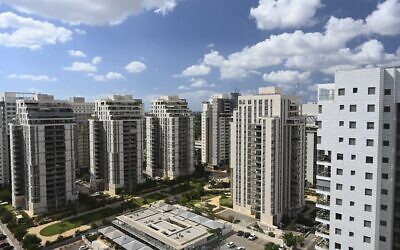 An illustrative photo of newly completed high-rise residential buildings in the 1200 neighborhood of Hod Hasharon, in central Israel on September 14, 2022. (Michael Giladi/Flash90)