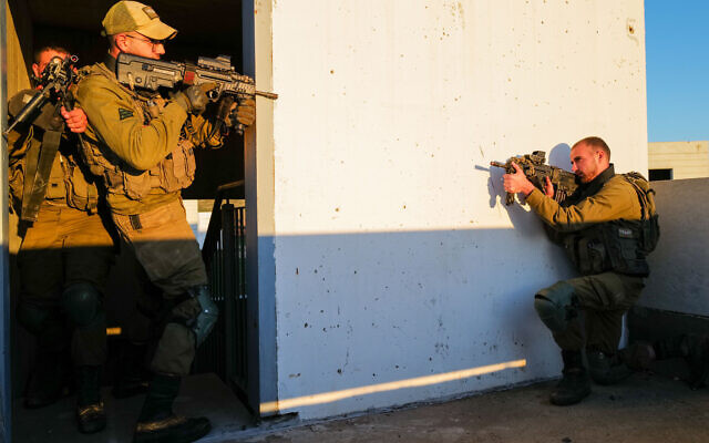 Illustrative: Soldiers from the Givati Brigade train near Kibbutz Merom Golan in northern Golan Heights on December 27, 2022. (Michael Giladi/Flash90)