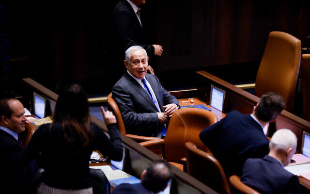 Incoming Benjamin Netanyahu with fellow Likud MKs in the Knesset, December 28, 2022. (Olivier Fitoussi/Flash90) Incoming Benjamin Netanyahu with fellow Likud MKs in the Knesset, December 28, 2022. (Olivier Fitoussi/Flash90)