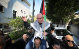 File: Arab Israeli Karim Younis is carried by friends and relatives following his release after 40 years in an Israeli prison for kidnapping and murdering an Israeli soldier, on January 5, 2023, in the northern Israeli town of 'Ara. (Jamal Awad/FLASH90)