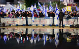 Protesters gather to rally against the Israeli government at Habima Square in Tel Aviv on January 14, 2023. (Avshalom Sassoni/Flash90)