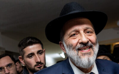 Shas chief Aryeh Deri outside his home in Jerusalem on January 18, 2023, hours after the High Court ruled he cannot serve as a government minister. (Yonatan Sindel/Flash90)
